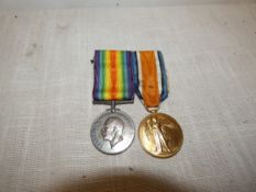 A WORLD WAR I MEDAL PAIR AWARDED TO 13464 SERGEANT T. MALLETT OF THE YORKSHIRE REGIMENT
