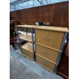 AN OPEN DISPLAY STAND WITH DRAWER AND MATCHING SIX DOOR CUPBOARD