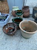 AN ASSORTMENT OF STONEWARE POTS