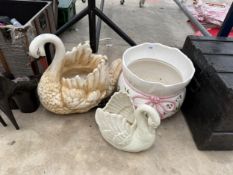 TWO CERAMIC SWAN PLANT POTS AND A FURTHER CERAMIC PLANT POT