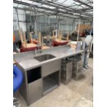 A STAINLESS STEEL SINK UNIT WITH SPRAY TAP
