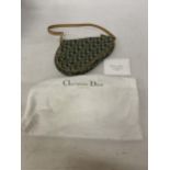 A CHRISTIAN DIOR TROTTER SADDLE CANVAS BAG IN GREEN WITH DUST COVER AND PAPERWORK