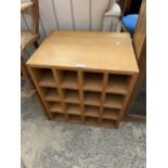 AN OAK SIXTEEN BOTTLE WINE RACK, 18.5" WIDE