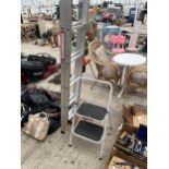 A TWO RUNG NON SLIP LADDER AND AN ALUMINIUM LOFT LADDER