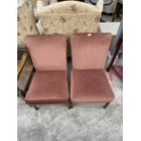 A PAIR OF PARKER KNOLL DUSTY PINK NURSING CHAIRS, MODEL NO. PK.747.MK.1
