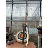 A PETRON STRONG ARCHERY BOW WITH A TARGET AND ARROWS