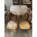 A PAIR OF ERCOL STYLE WINDSOR CHAIRS