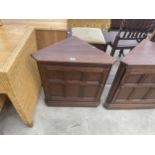 AN ERCOL ELM SINGLE DOOR CORNER CUPBOARD, 27" WIDE