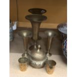 FOUR ANGLO-INDIAN BRASS TRUMPET VASES OF VARYING SIZE WITH HAND-GRAVED FLORAL PATTERNS WITH RED
