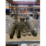 A COLLECTION OF SMOKEY GLASS PIECES TO INCLUDE TUMBLERS, JUGS, PITCHERS ETC