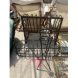 A LARGE CAST IRON HAYRACK, A FURTHER HAYRACK AND A PLANT STAND