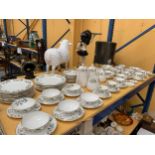 A LARGE QUANTITY OF CROWN STAFFORDSHIRE DINNERWARE TO INCLUDE VARIOUS SIZES OF PLATES, SOUP COUPES