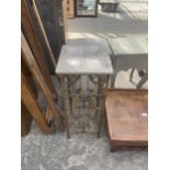 A METALWARE JARDINIER PLANT STAND WITH MARBLE TOP AND FOLIATE DECORATION