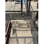 A VINTAGE CAST IRON SINK BRACKET AND A METAL PLANT STAND