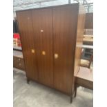 A G PLAN E GOMME THREE DOOR WARDROBE, TWO BEING BI-FOLD ON BRASS FEET, 48" WIDE