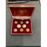 A BOXED LIMITED EDITION SET OF CUNARD QE2 SHIPPING UNIFORM BUTTONS BRANDED WITH THE HARRODS LOGO