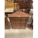 AN ERCOL ELM SINGLE DOOR CORNER CUPBOARD, 27" WIDE