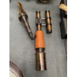 A LEATHER AND BRASS 'ROYAL NAVY' TELESCOPE ON STAND