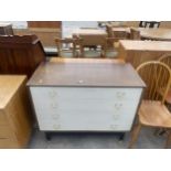 A G.PLAN E.GOMME RETRO CHEST OF FOUR PAINTED DRAWERS WITH BRASS HANDLES