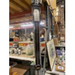 A LONG CASED STICK BAROMETER BY J BLATT OF BRIGHTON