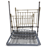 An antique Chapmans of Trowbridge brass double bed frame with sprung base- Overall size height