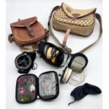 A collection of fishing reels, flies and bags along with a Flextec fly rod