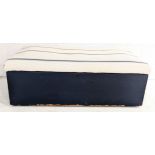 A painted ottoman with upholstered top on castor wheels - Overall size height 46cm, width 130cm,
