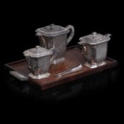 A four-part Art Deco silver coffee and tea set on a matching plate, H 14 - 19 cm, total weight: 2736