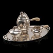 A four-part Georg Jensen (1866-1935) silver 'Magnolia/Blossom' coffee and tea set, hallmarked, dated