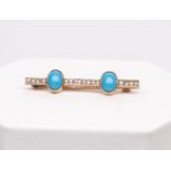 Brosche, 18kt Gelbgold und Platin, ca. 1900/1910, 2 Türkis-Cabochons, 16 kleine Diamantrosen, ca. 3