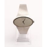 Jean Perret, Damenarmbanduhr, 1970/80er Jahre, Genf, 18kt WG, elliptisches Gehäuse mit verlötetem f
