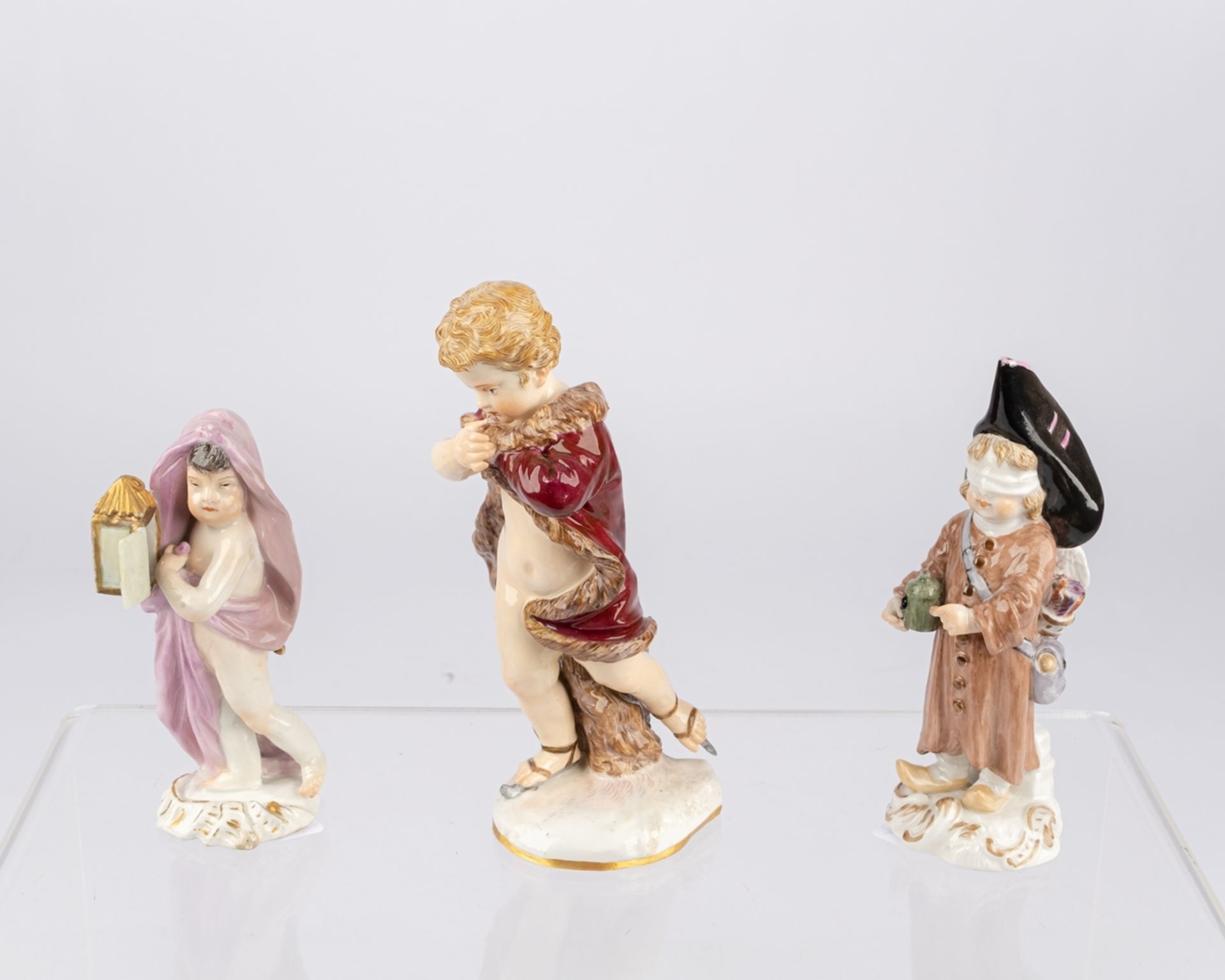 3 Porzellanfiguren, "Amorette mit Laterne", "Amorette als Bettler", "Putto als Allegorie des Winter