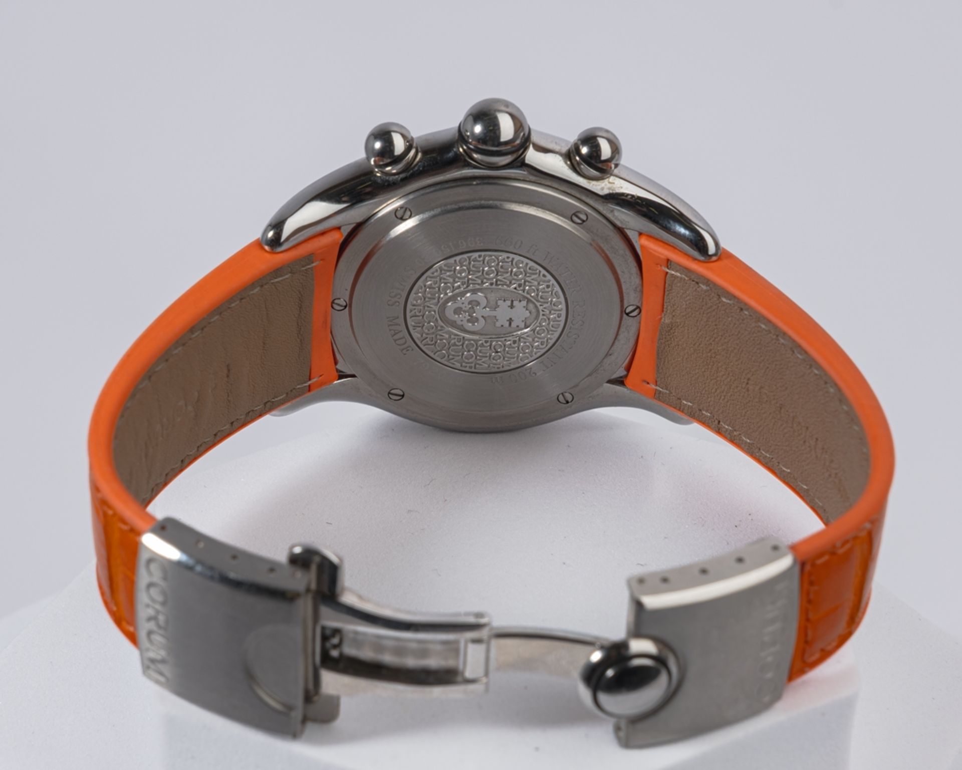 Corum Bubble Chronograph Quarz, Ref. 396.150.20, Gehäuse in Stahl, Zifferblatt orange mit drei silb - Bild 2 aus 2