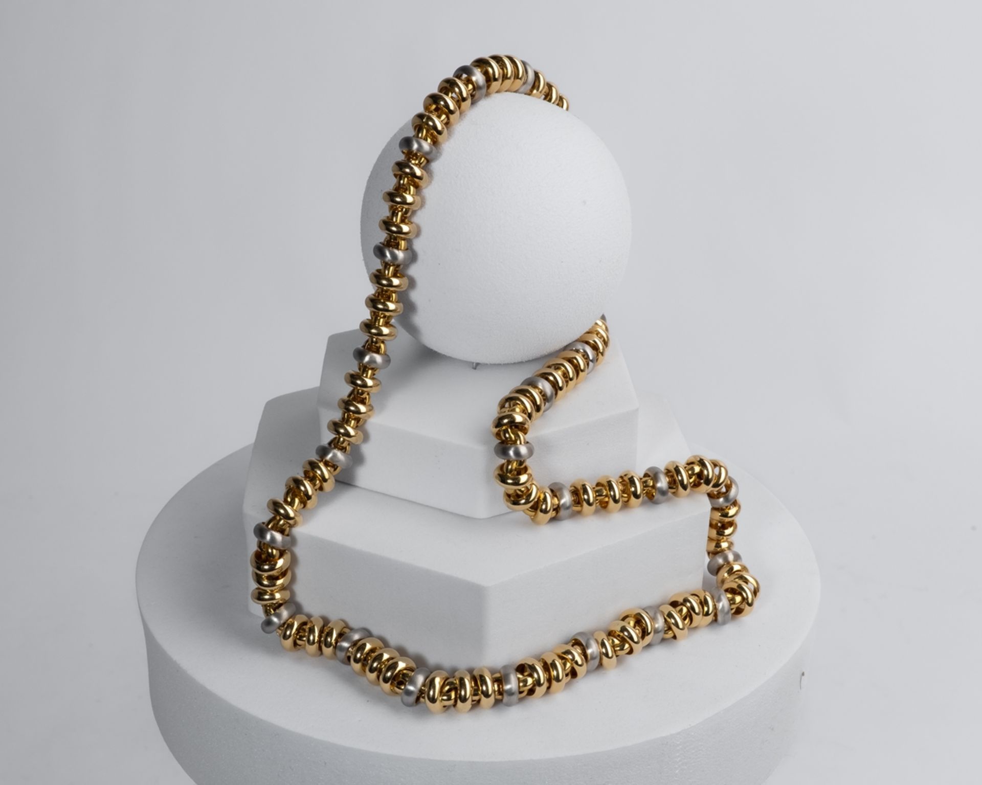 Kette, 18kt Gelbgold/Weißgold, ca. 100.7 g, ca. 60 cm lang.