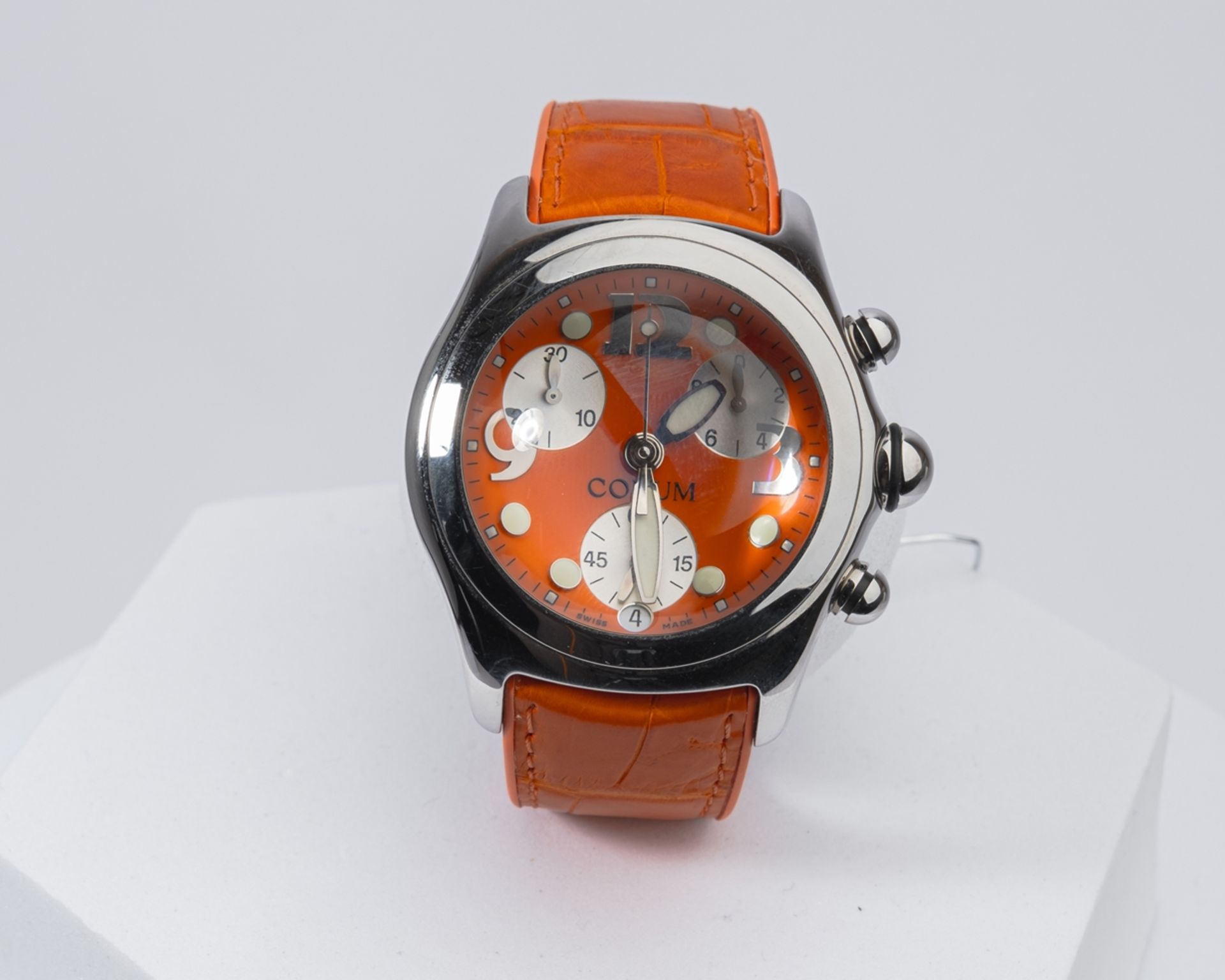 Corum Bubble Chronograph Quarz, Ref. 396.150.20, Gehäuse in Stahl, Zifferblatt orange mit drei silb