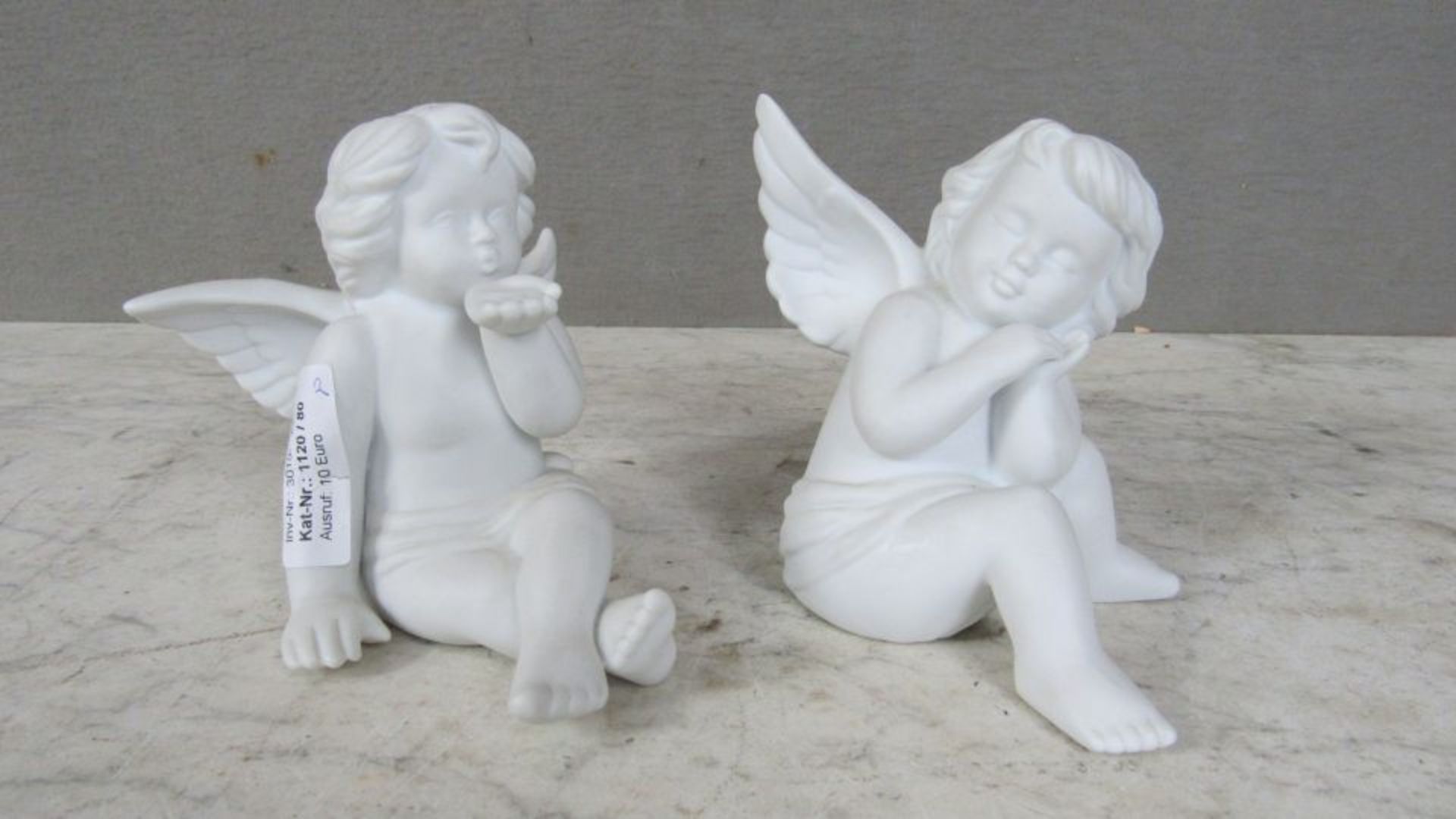 Zwei Porzellanengel sitzend 13,5cm