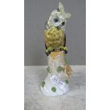 Porzelanfigur Uhu auf Ast 23,5 cm