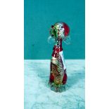 Skulptur sitzender Hund gelabelt