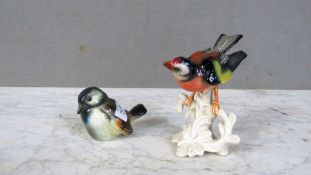 Zwei Figuren Vögel
