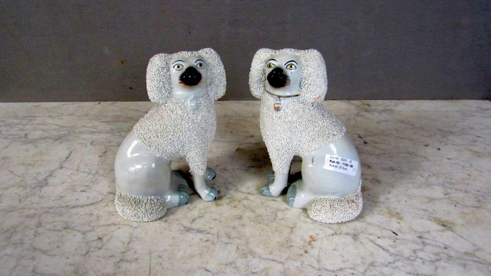2 Porzellanfiguren Hunde Puffhunde