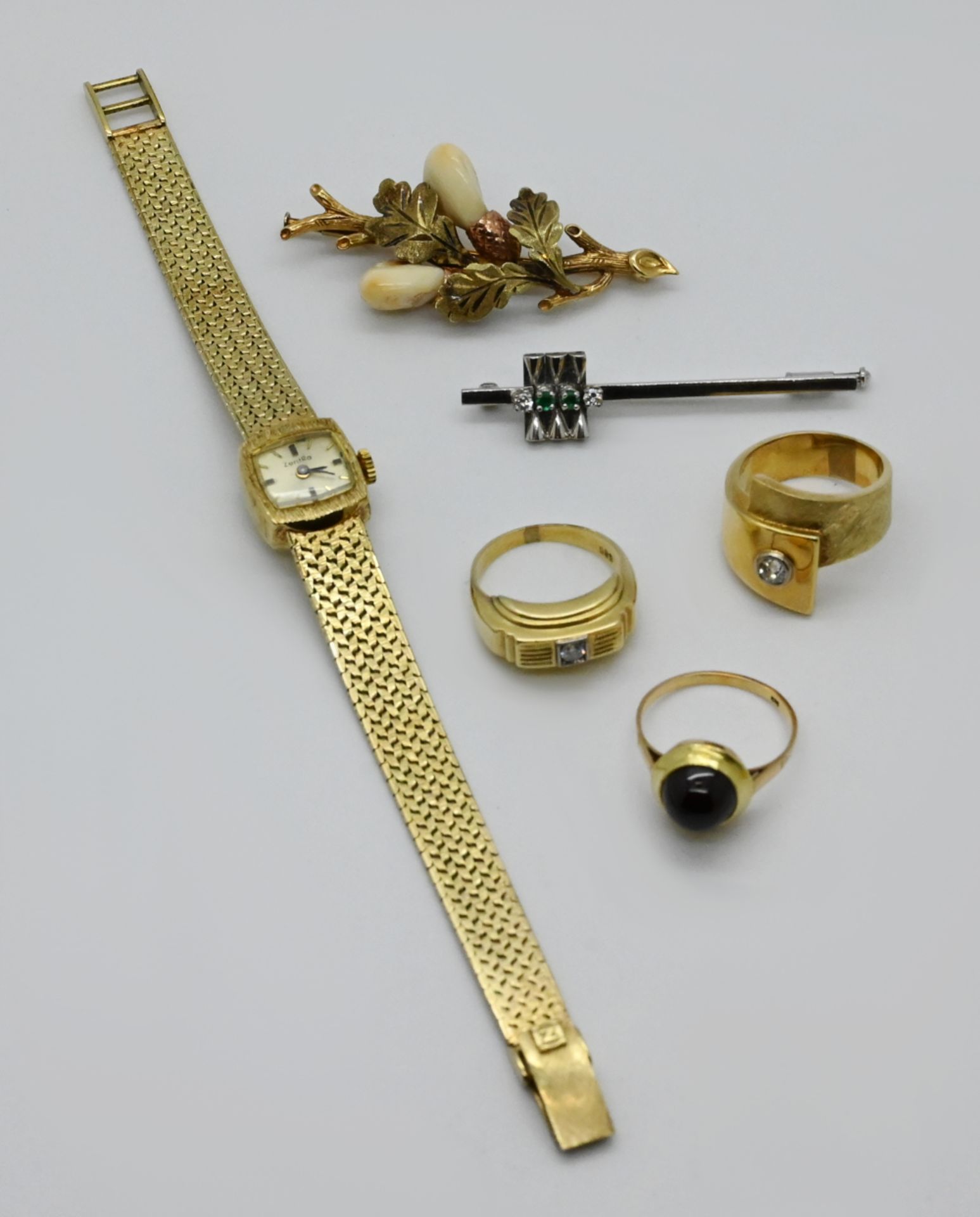 1 Brosche WG 18ct. L ca. 5cm, mit 2 Brill. je ca. 0,05ct., wohl 2 kl ...