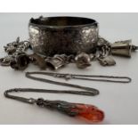A selection of silver and unmarked white metal jewellery, to include a hallmarked silver charm