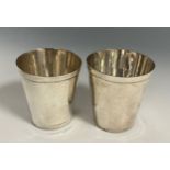 A pair of Elizabeth II silver tapered cylindrical whisky beakers, 5.5cm high, Deakin & Francis,