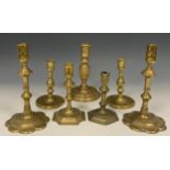 A pair of 18th century brass candlesticks, seamed column, tulip shaped socket, 15cm high, c.1720;