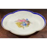 A Derby porcelain quatrefoil dish, the central well hand-painted with a spray of lilies,