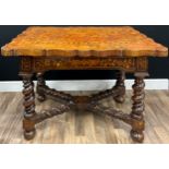 A Dutch mahogany and marquetry shaped rectangular side table, oversailing top inlaid with a