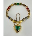 A Victorian unmarked yellow metal semi-precious gemstone set padlock bracelet, the bracelet set with