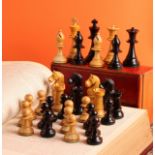 A boxwood and ebonised Staunton pattern chess set, the Kings 9cm high