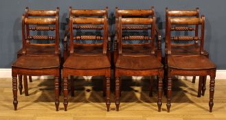 A set of eight post-Regency mahogany dining chairs, comprising six side chairs and a pair of
