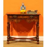 An 18th century walnut side table, featherbanded rectangular top above a long frieze drawer,